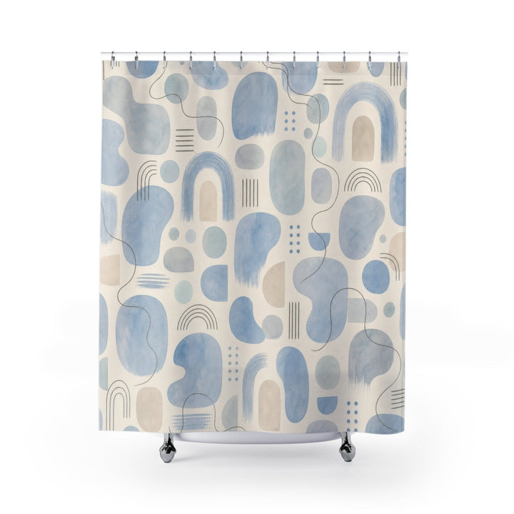 Cream shower curtain with powder-blue abstract blocks, arches, and fine marks