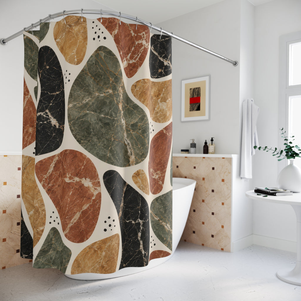 Sage, terracotta, ochre and black marble shapes on cream shower curtain beside a freestanding tub
