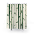 Green bamboo canes and small leaf fans on ivory shower curtain with full front view
