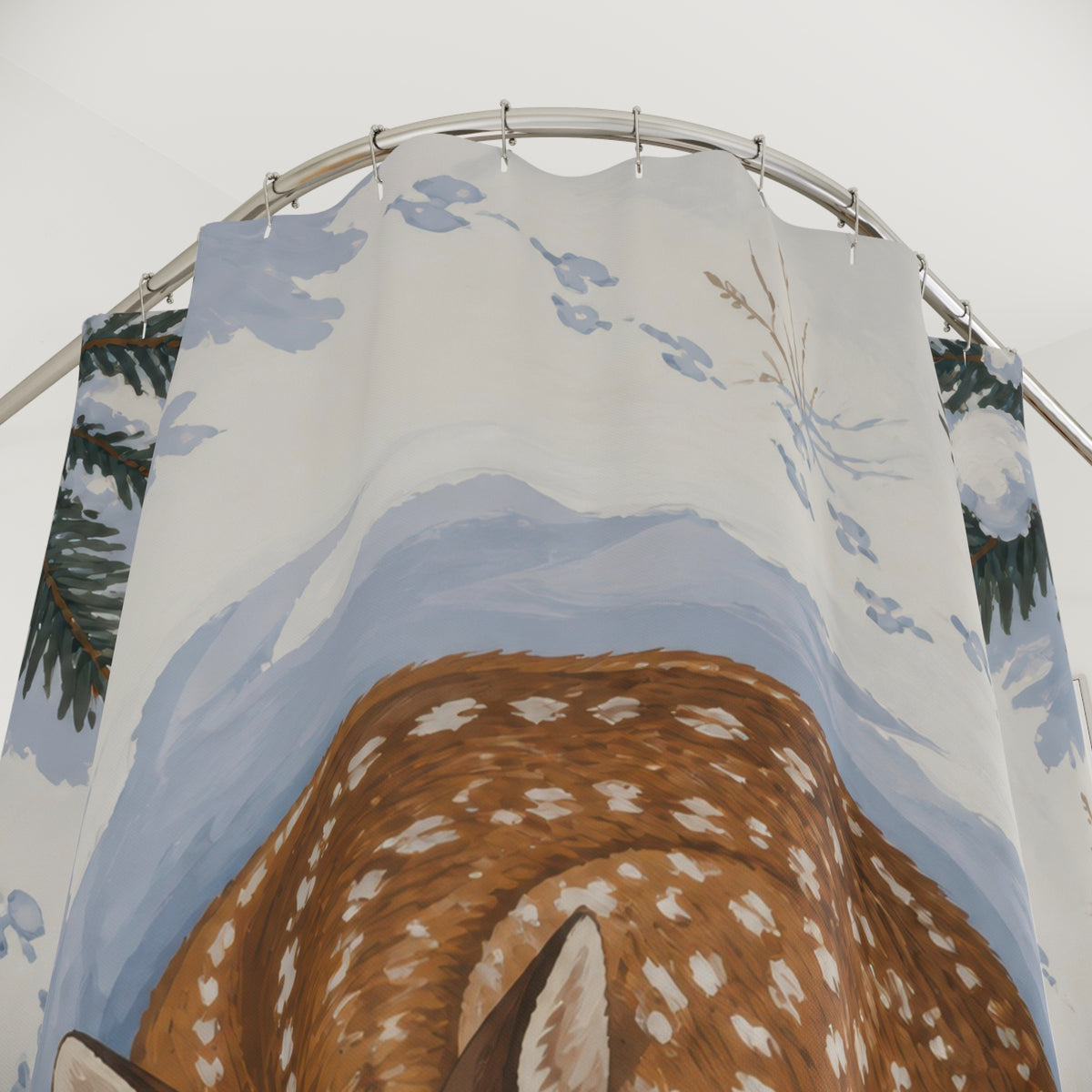 Curled fawn in snowy pine hollow shower curtain with close-up print, hooks, and folds