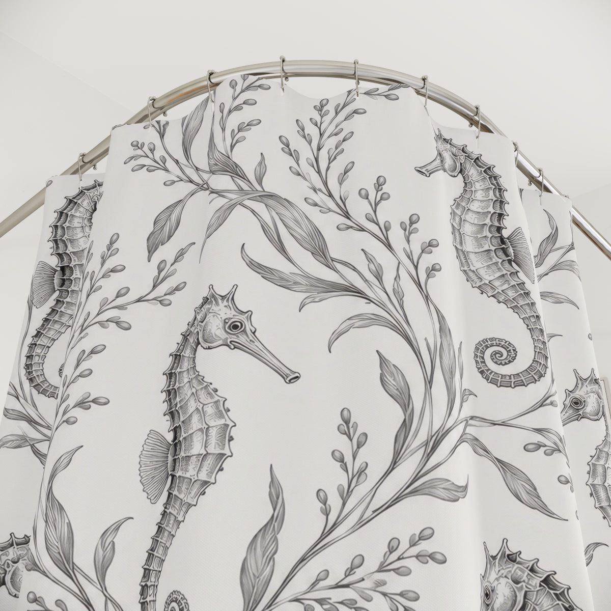 Silver seahorses among fine gray seaweed fronds shower curtain with close-up print, hooks, and folds