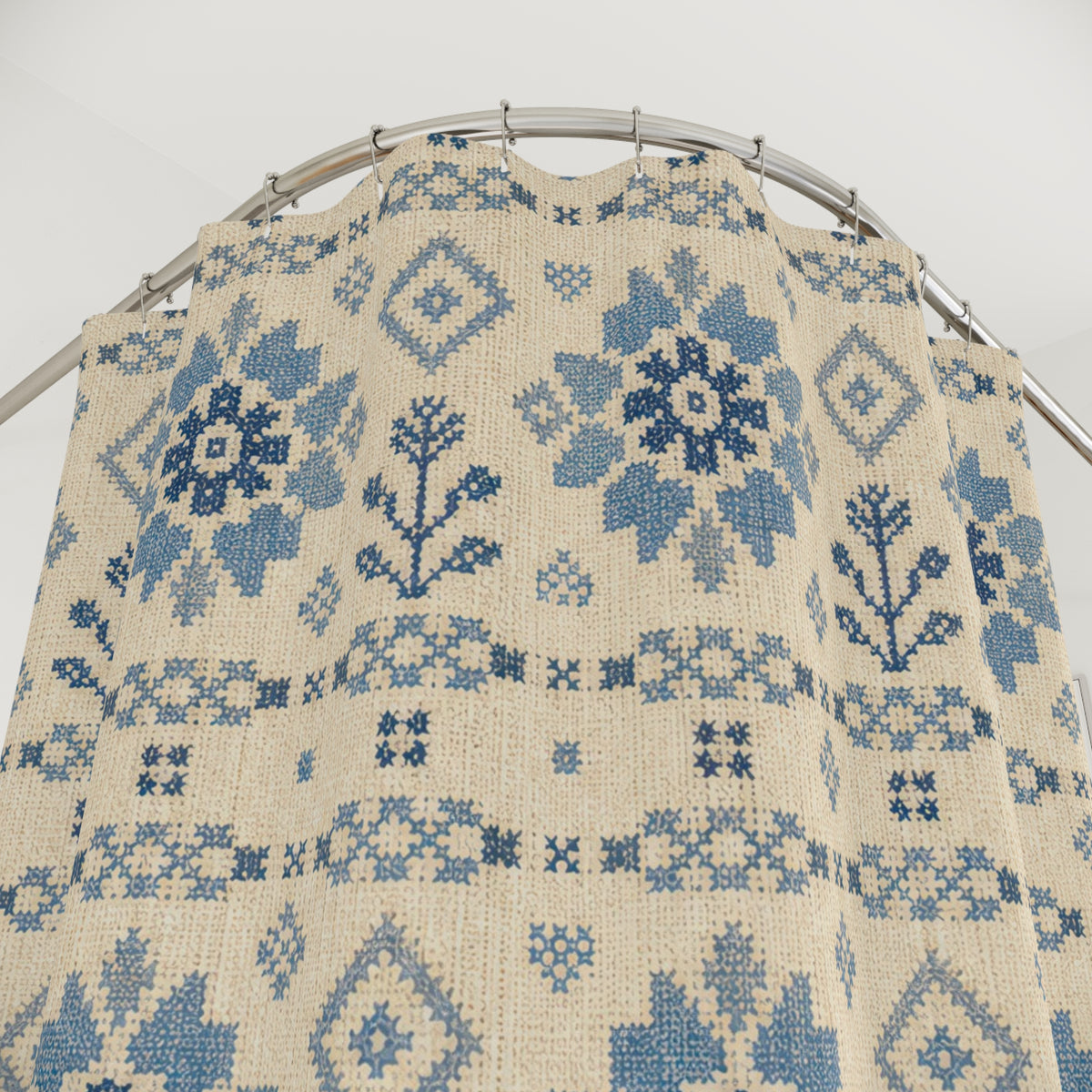 Blue Coverlet Floral farmhouse style shower curtain with close-up print, hooks, and folds