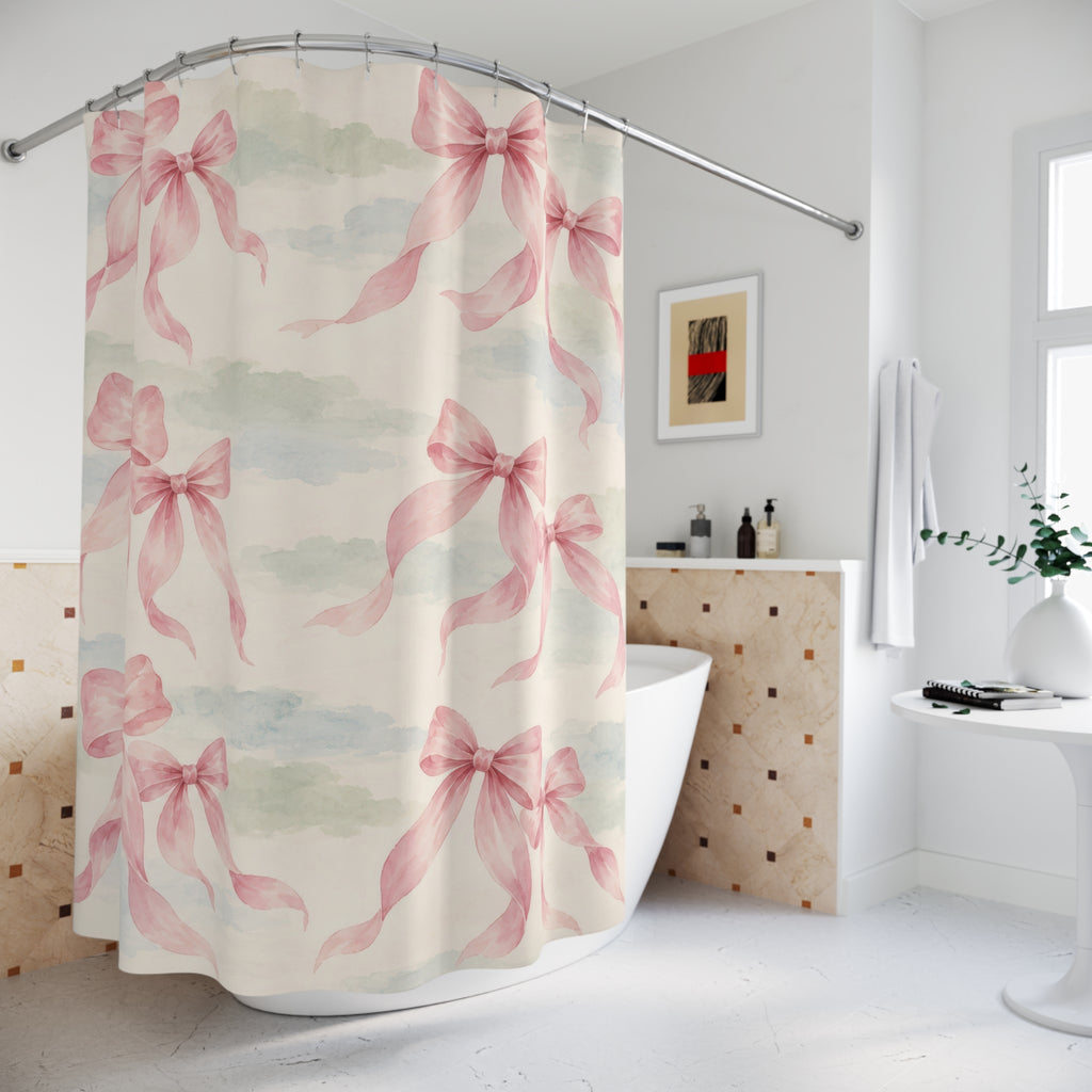 Pink bow pairs over pale sage and dusty blue washes shower curtain beside a freestanding tub