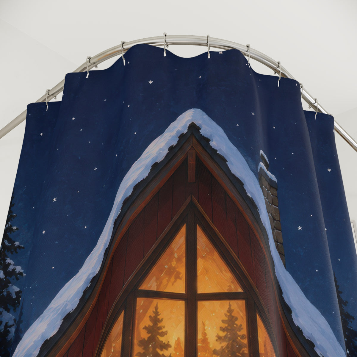Snowy red A-frame cabin with amber windows shower curtain with close-up print, hooks, and folds