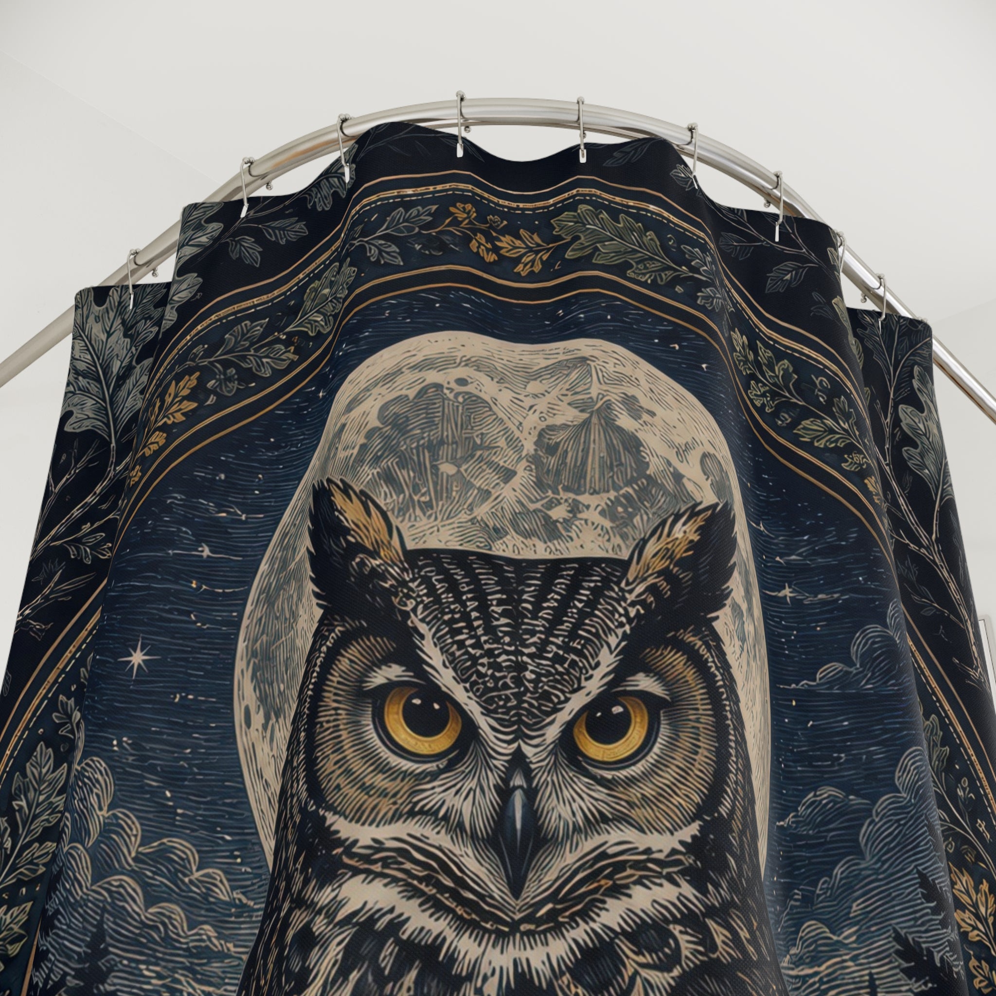 Close-up of Indigo owl framed by a silver moonlit botanical medallion shower curtain with hooks and folds