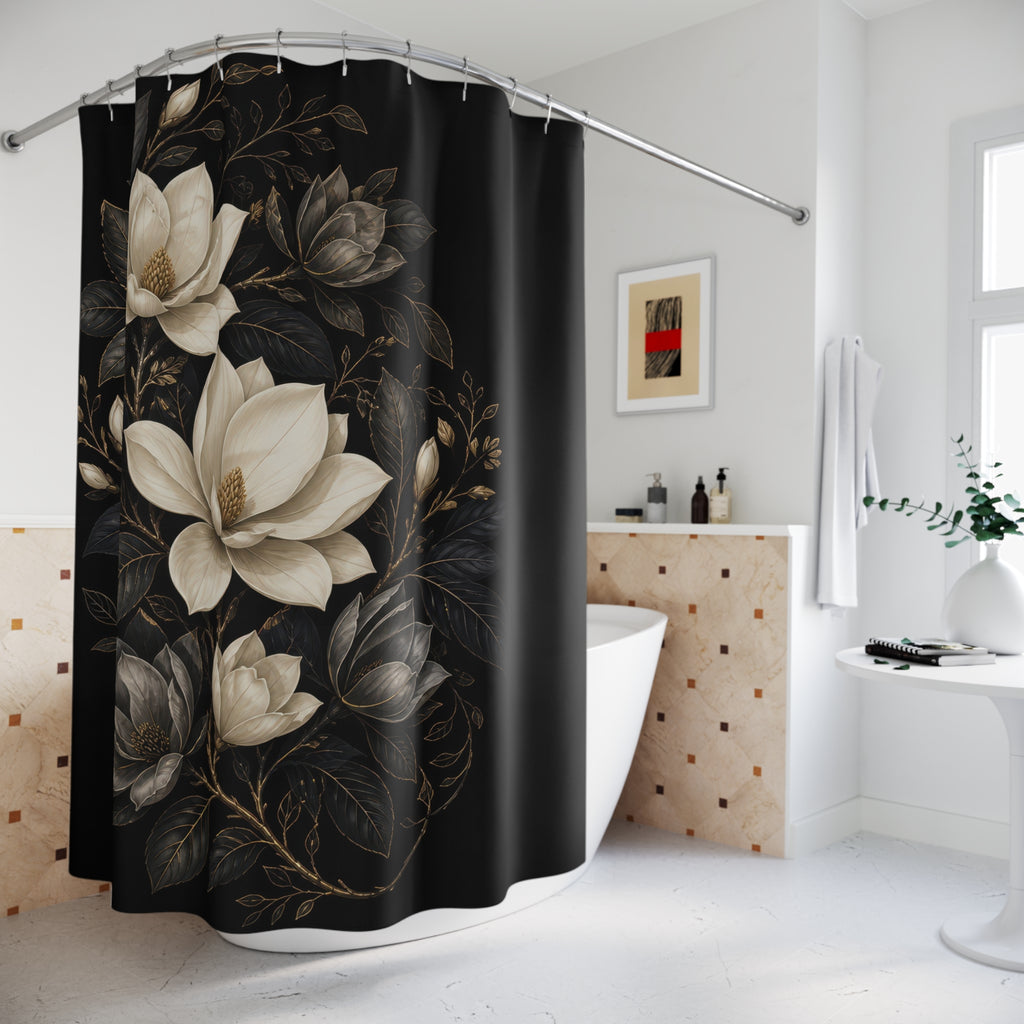 Ivory and charcoal magnolias in an oval medallion on black shower curtain styled beside a freestanding tub