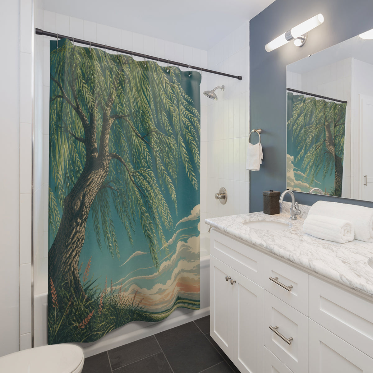 Low-angle willow tree canopy against a teal sky shower curtain beside a white vanity
