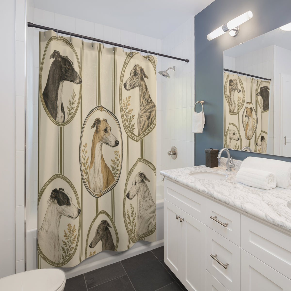 Whippet portraits over olive ticking stripes shower curtain beside a white vanity