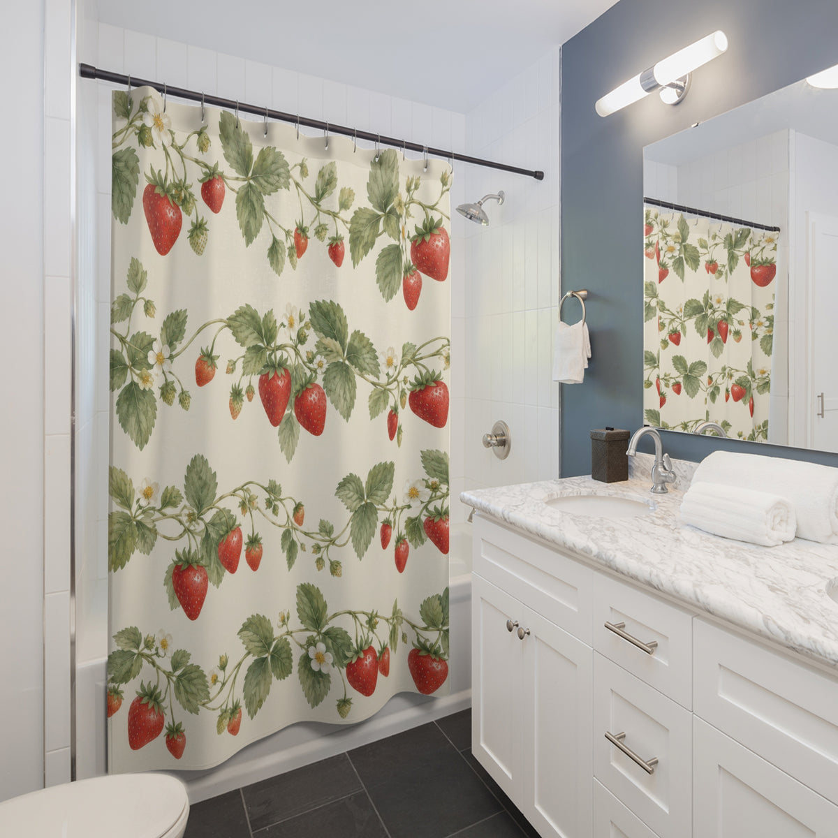Red strawberries and sage leaves in rows on ivory shower curtain beside a white vanity