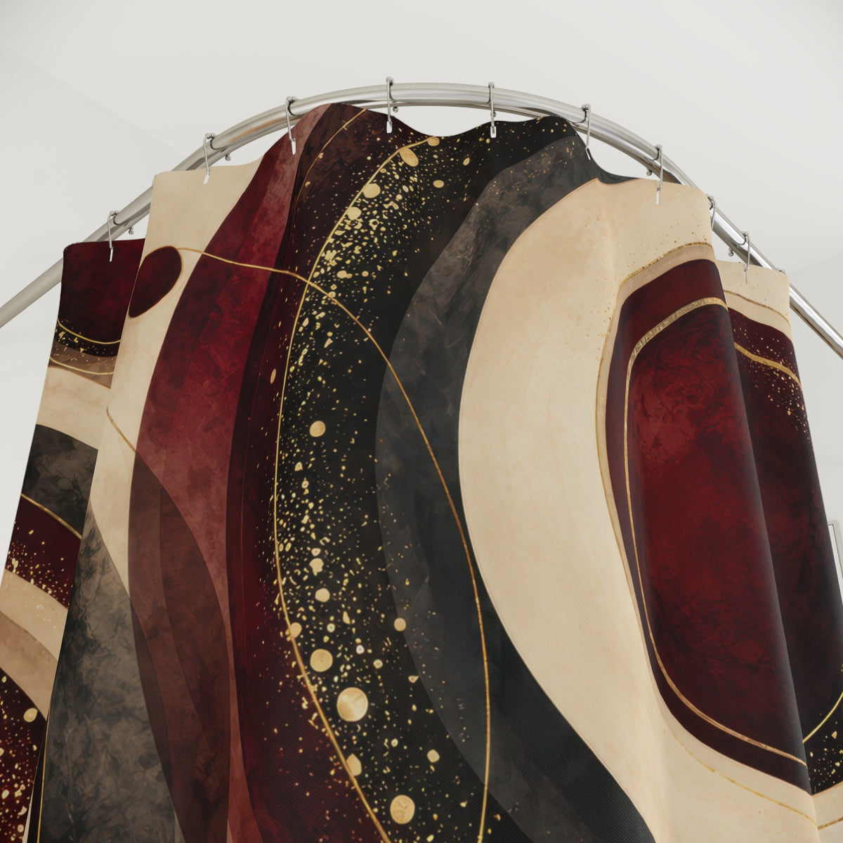 Burgundy circles with cream bands and gold-colored flecks shower curtain with close-up print, hooks, and folds
