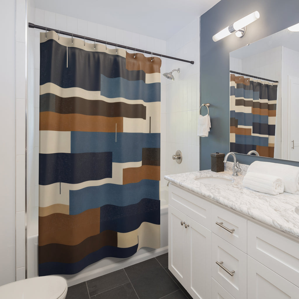 Blue and brown staggered horizontal bars on cream shower curtain beside a white vanity