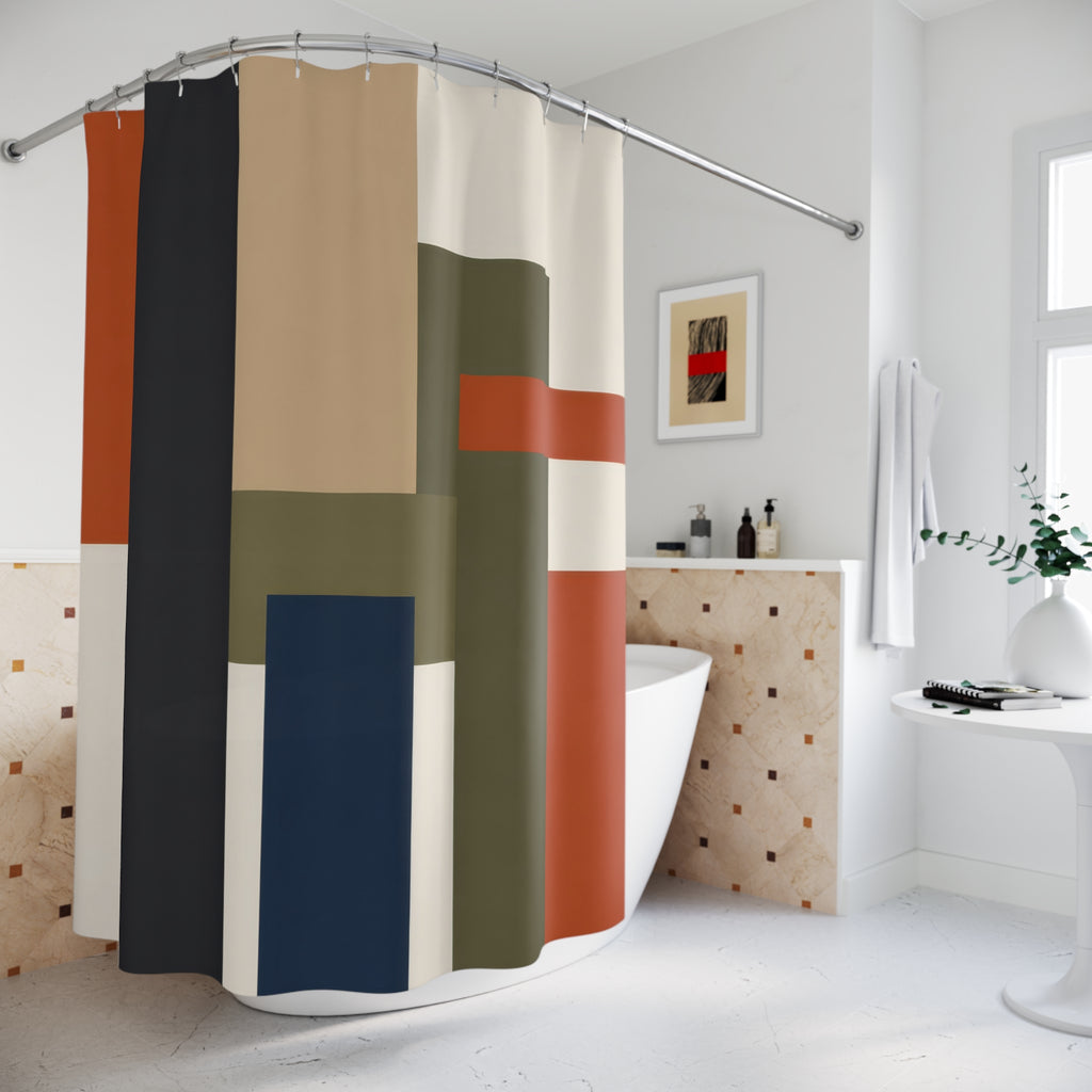 Charcoal rust and olive architectural blocks shower curtain beside a freestanding tub