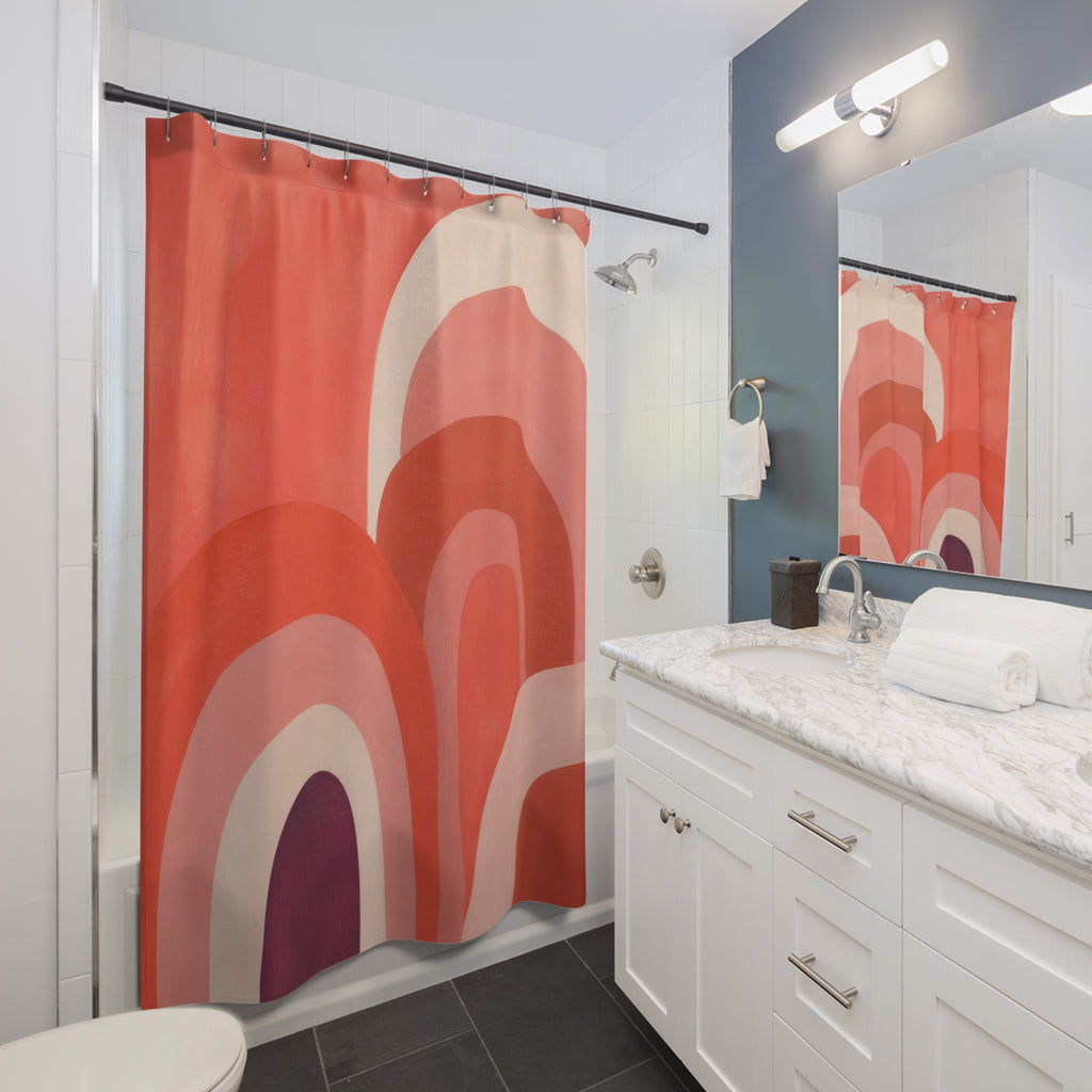 Overlapping coral rainbow arches with a plum accent shower curtain beside a white vanity