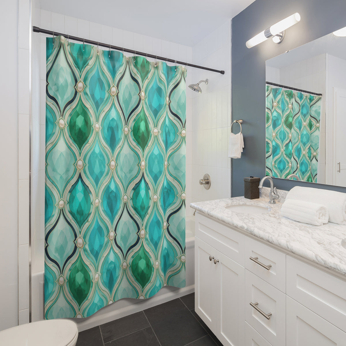 Turquoise faceted droplet and ivory pearl ogee lattice shower curtain beside a white vanity