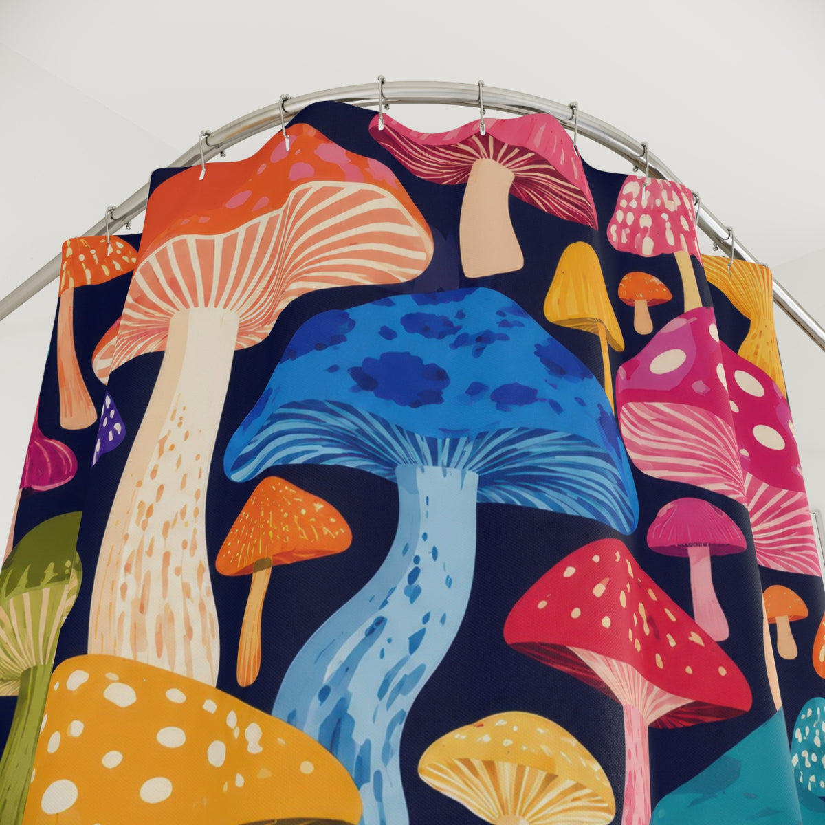 Colorful mushroom caps on deep navy shower curtain with close-up print, hooks, and folds
