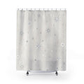 Silver starbursts and faceted nodes linked by white orbit lines shower curtain with full front view