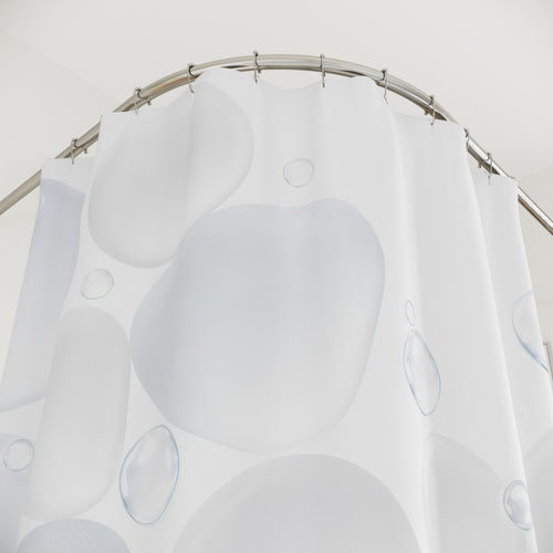 Abstract Pebble White shower curtain with close-up print, hooks, and folds