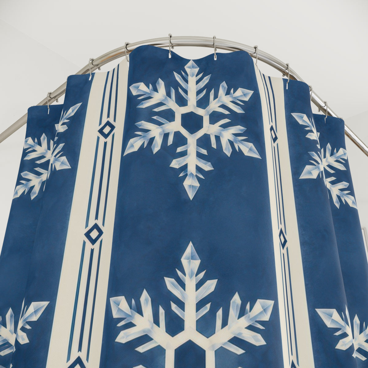 Indigo striped white snowflakes shower curtain with close-up print, hooks, and folds