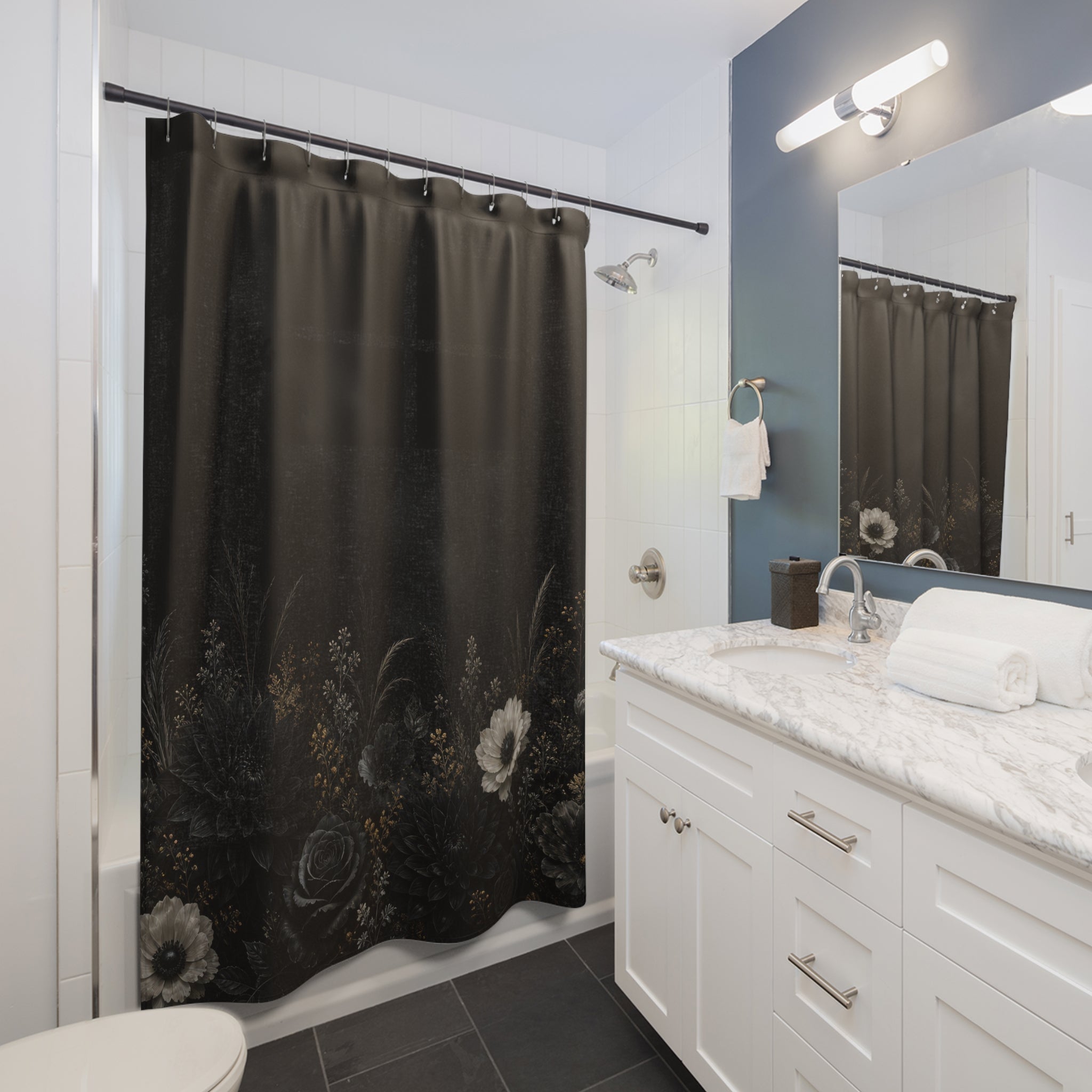 Nocturnal black garden with moonlit flowers and gold grasses shower curtain installed beside a white vanity