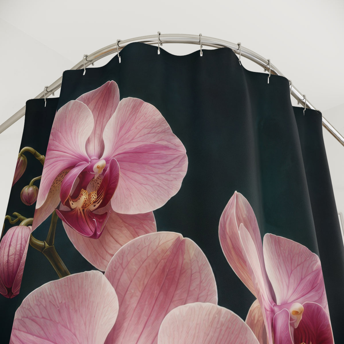 Pink orchids with burgundy centers on midnight teal shower curtain with close-up print, hooks, and folds