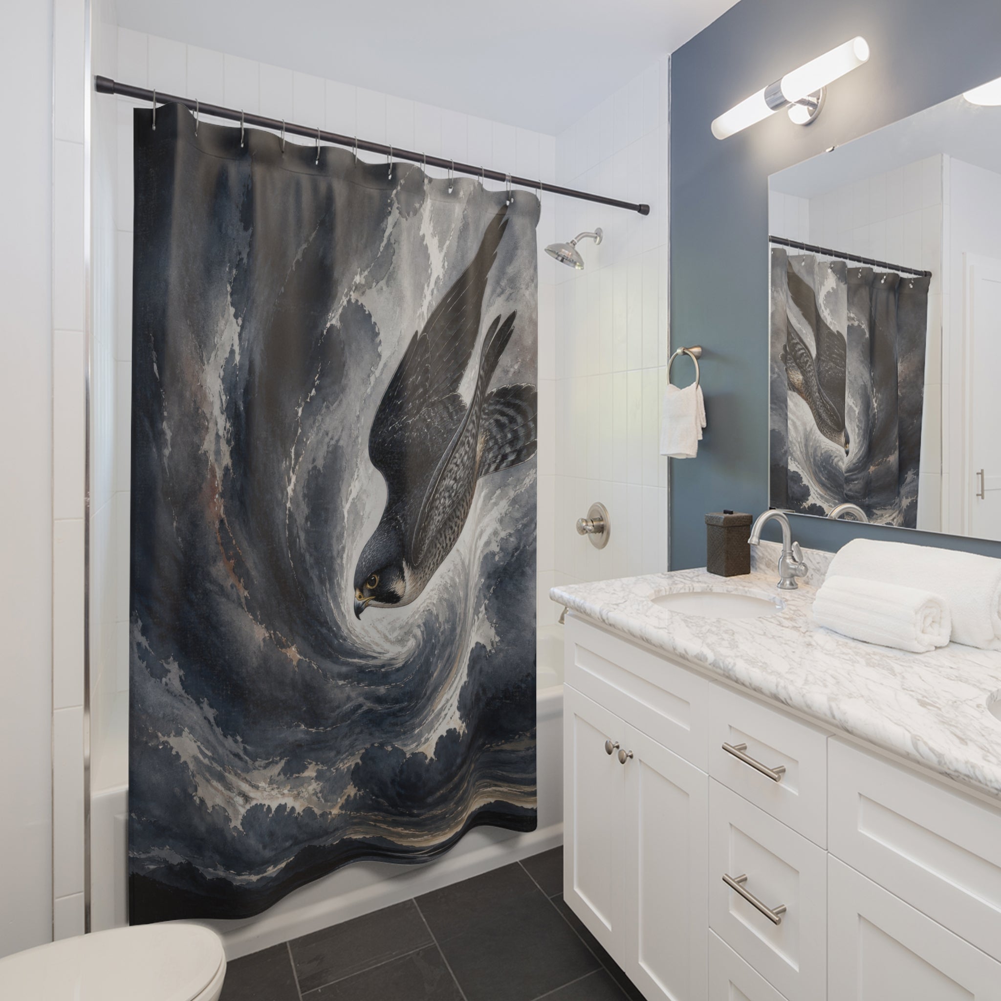 Diving falcon inside a charcoal and slate blue storm spiral shower curtain installed beside a white vanity