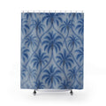 Blue palm trees with interlaced trunks on pale blue shower curtain with full front view