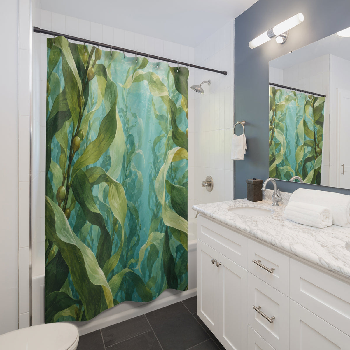 Green kelp in pale aqua water shower curtain beside a white vanity