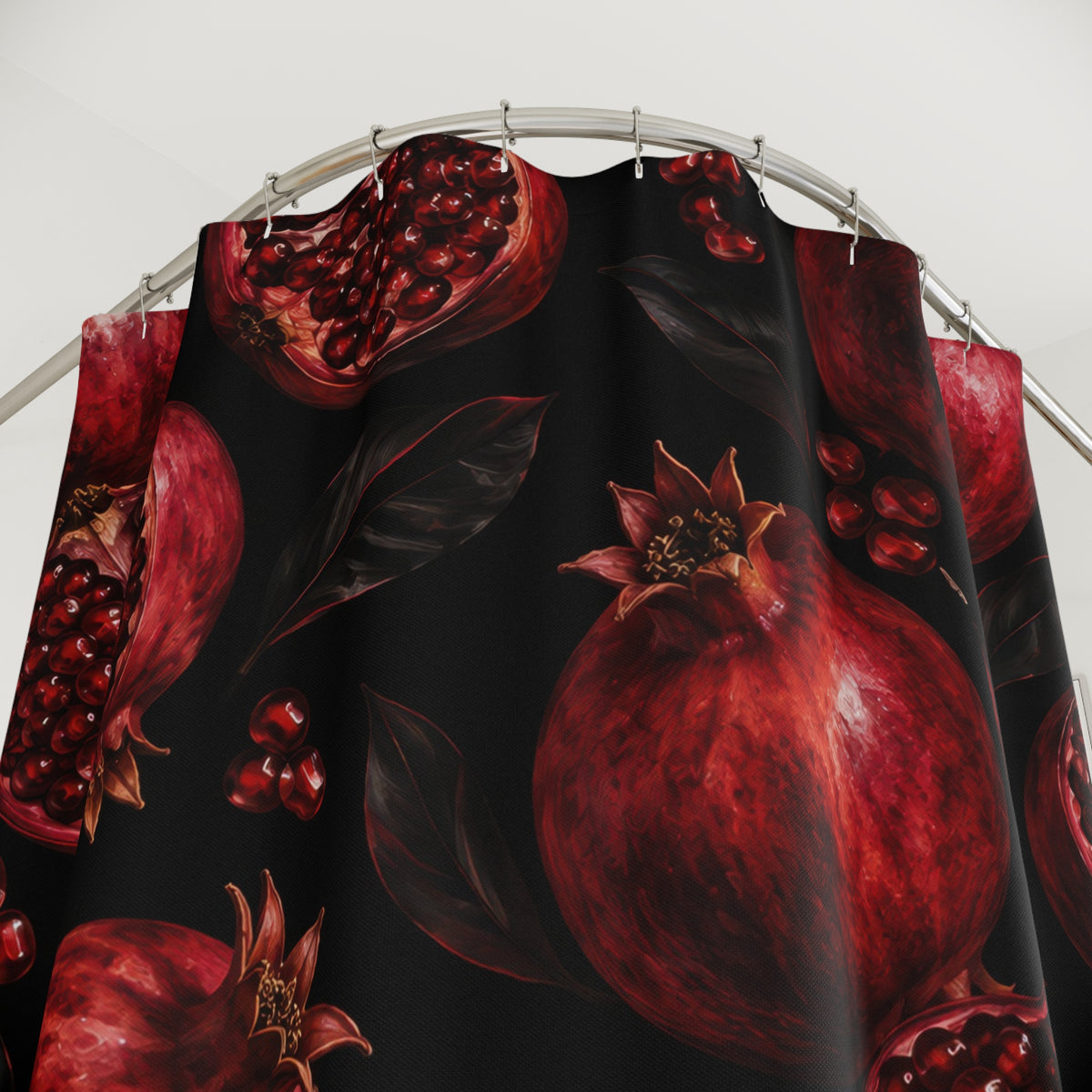 Ruby pomegranates and red seeds with black leaves shower curtain with close-up print, hooks, and folds