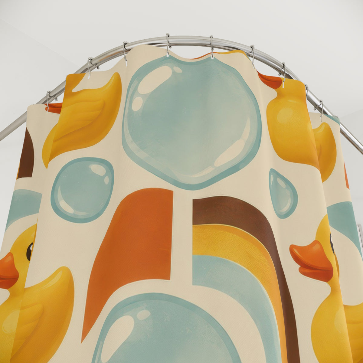 Rubber ducks with aqua bubbles and retro orange arches shower curtain with close-up print, hooks, and folds