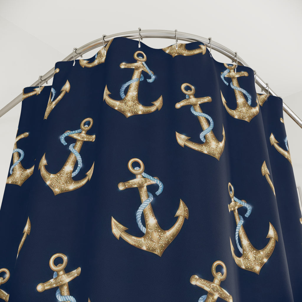 Gold-colored anchors and blue ropes on navy shower curtain with close-up print, hooks, and folds