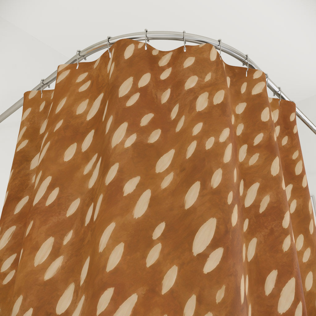 Ivory fawn spots scattered over golden caramel brown shower curtain with close-up print, hooks, and folds