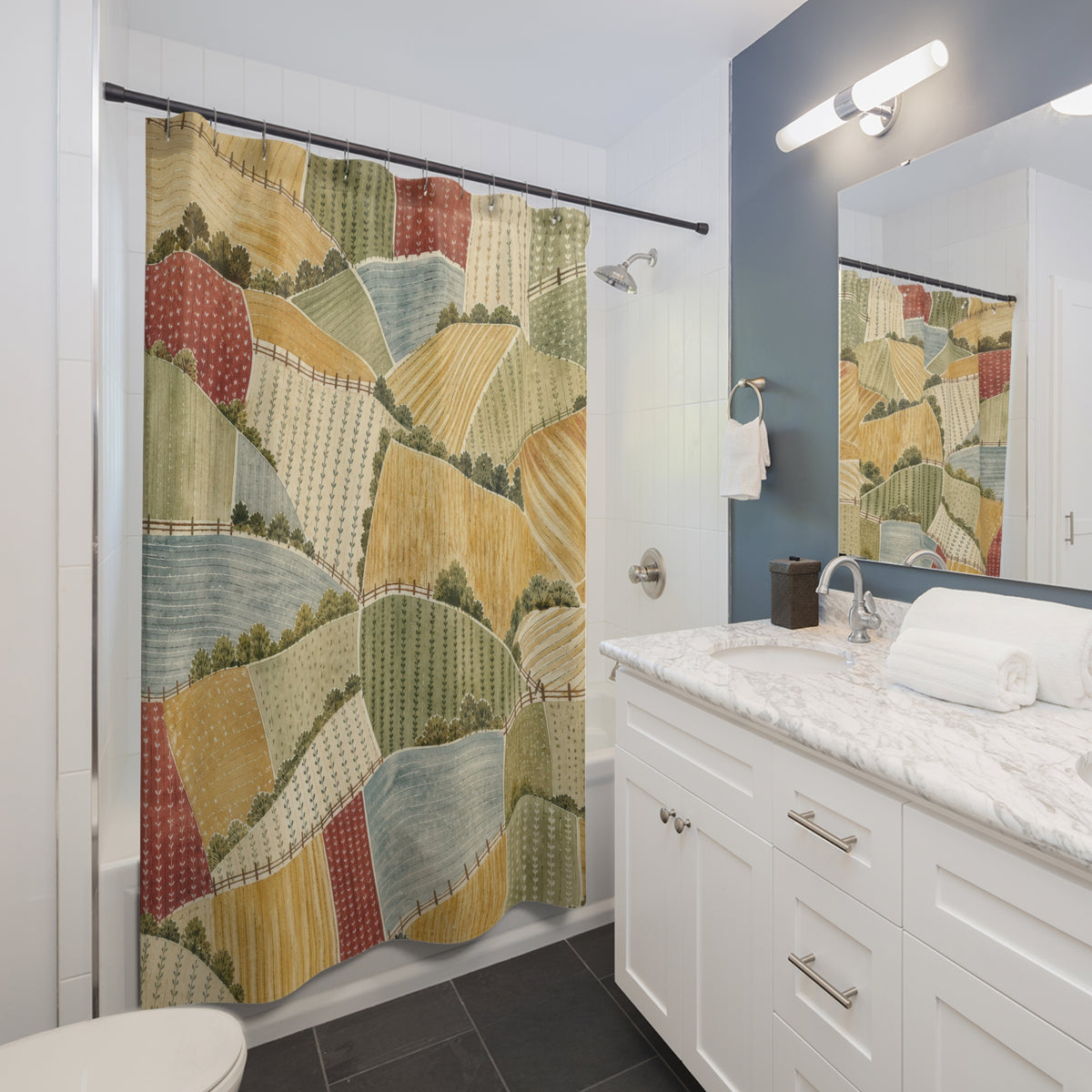 Patchwork Farm Landscape Country pattern shower curtain beside a white vanity