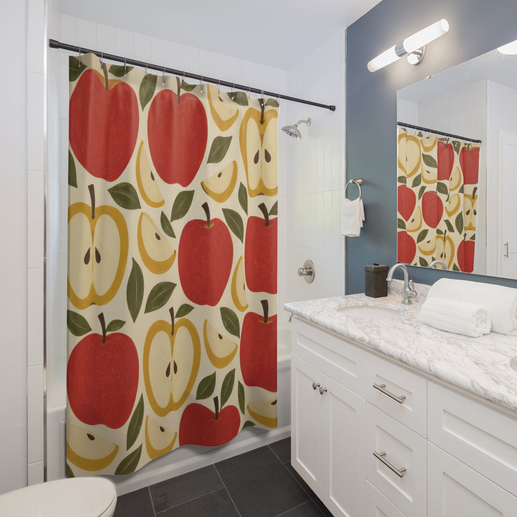 Red apples and yellow apple halves with olive leaves shower curtain beside a white vanity