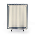Navy stepped borders around an ivory center shower curtain with full front view