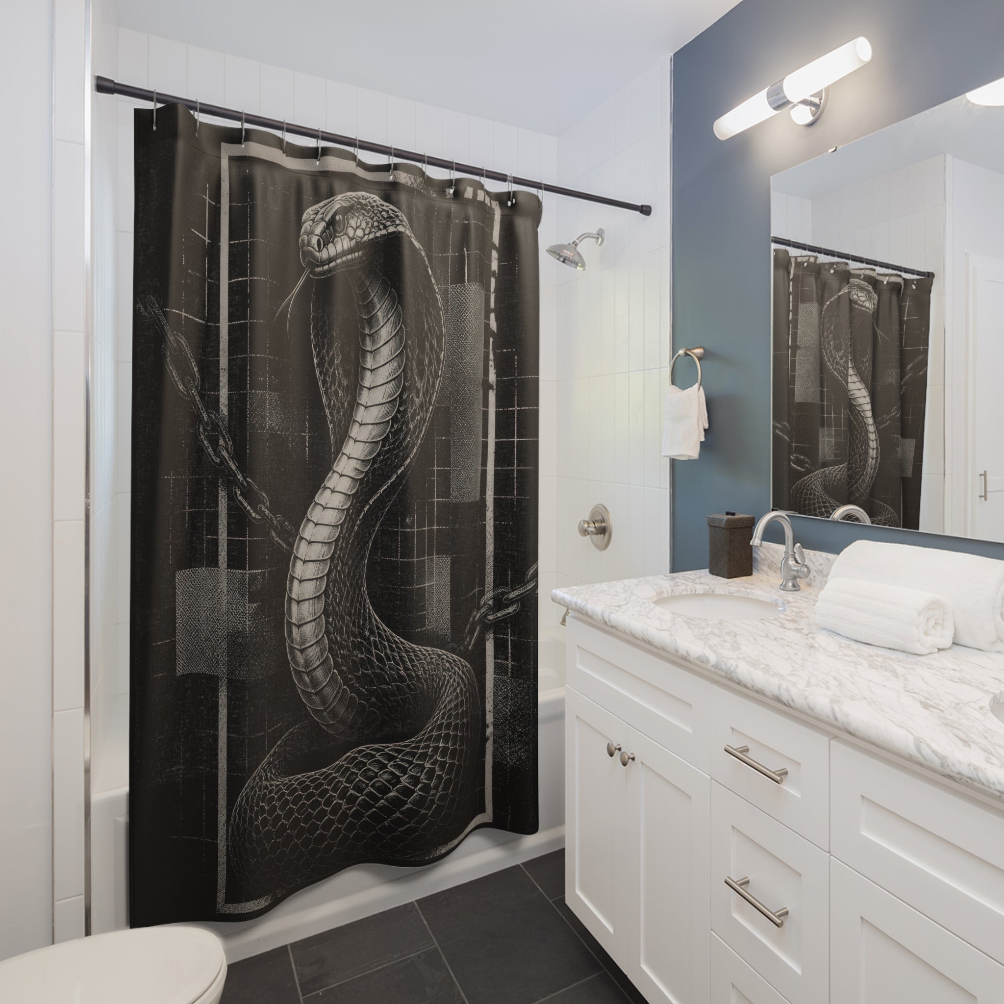Black and grey cobra rising through chains and broken grid bars shower curtain beside a white vanity