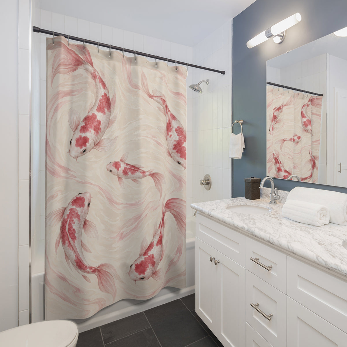 Pink and white koi gliding through pale cream water shower curtain beside a white vanity