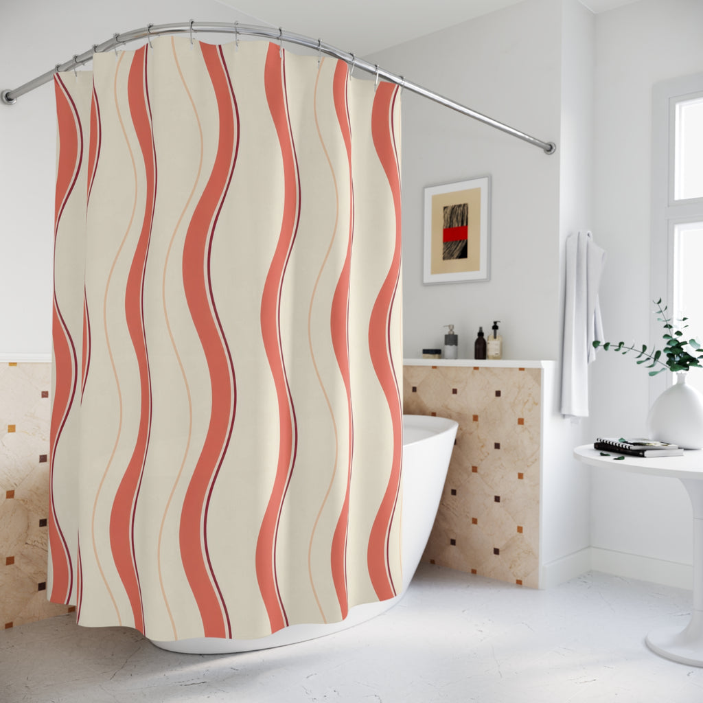 Coral wavy stripes with burgundy lines on cream shower curtain beside a freestanding tub