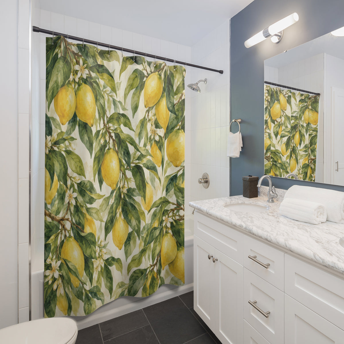 Yellow lemons, green leaves and small white blossoms shower curtain beside a white vanity