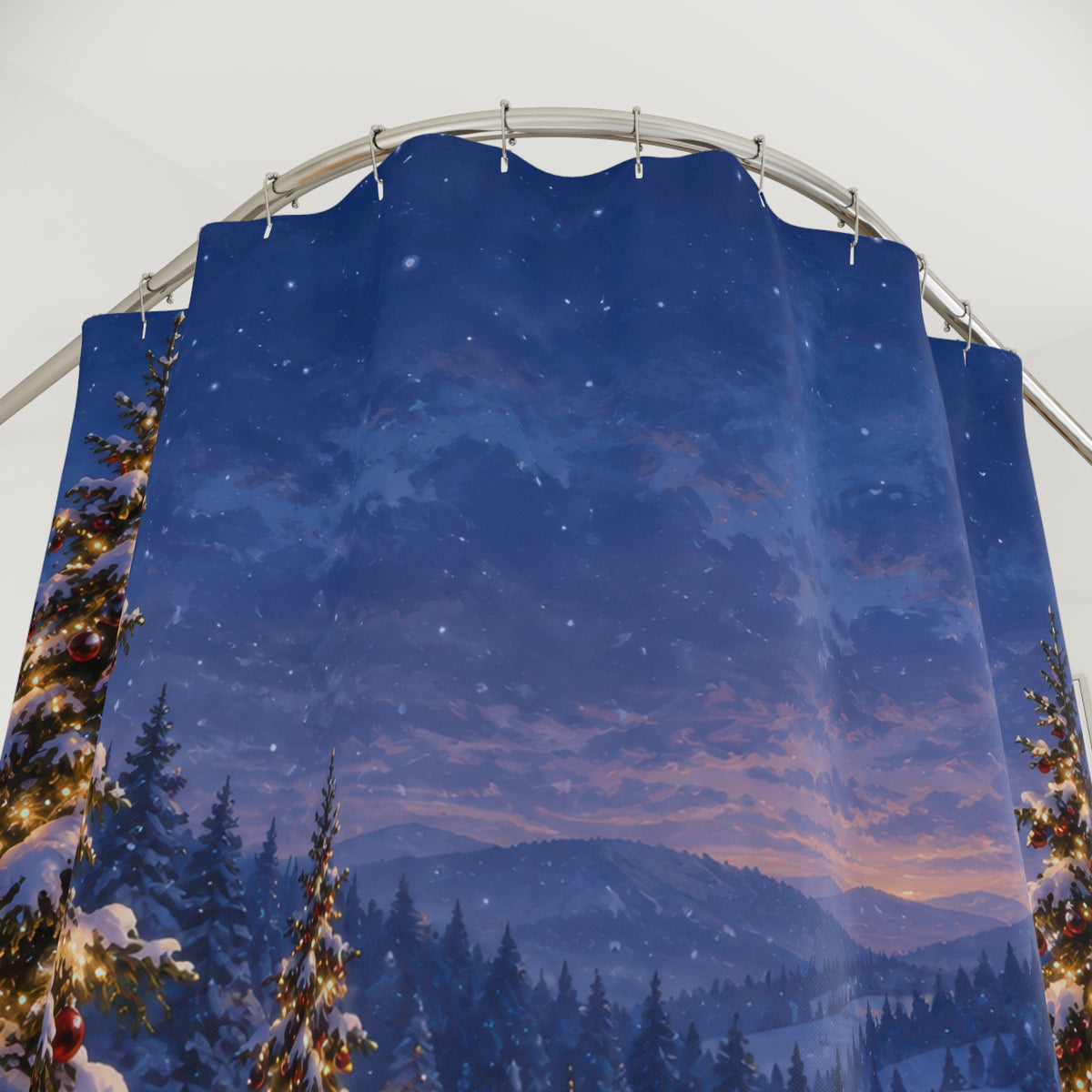 Snowy Christmas trees with warm lights in a blue winter valley shower curtain with close-up print, hooks, and folds