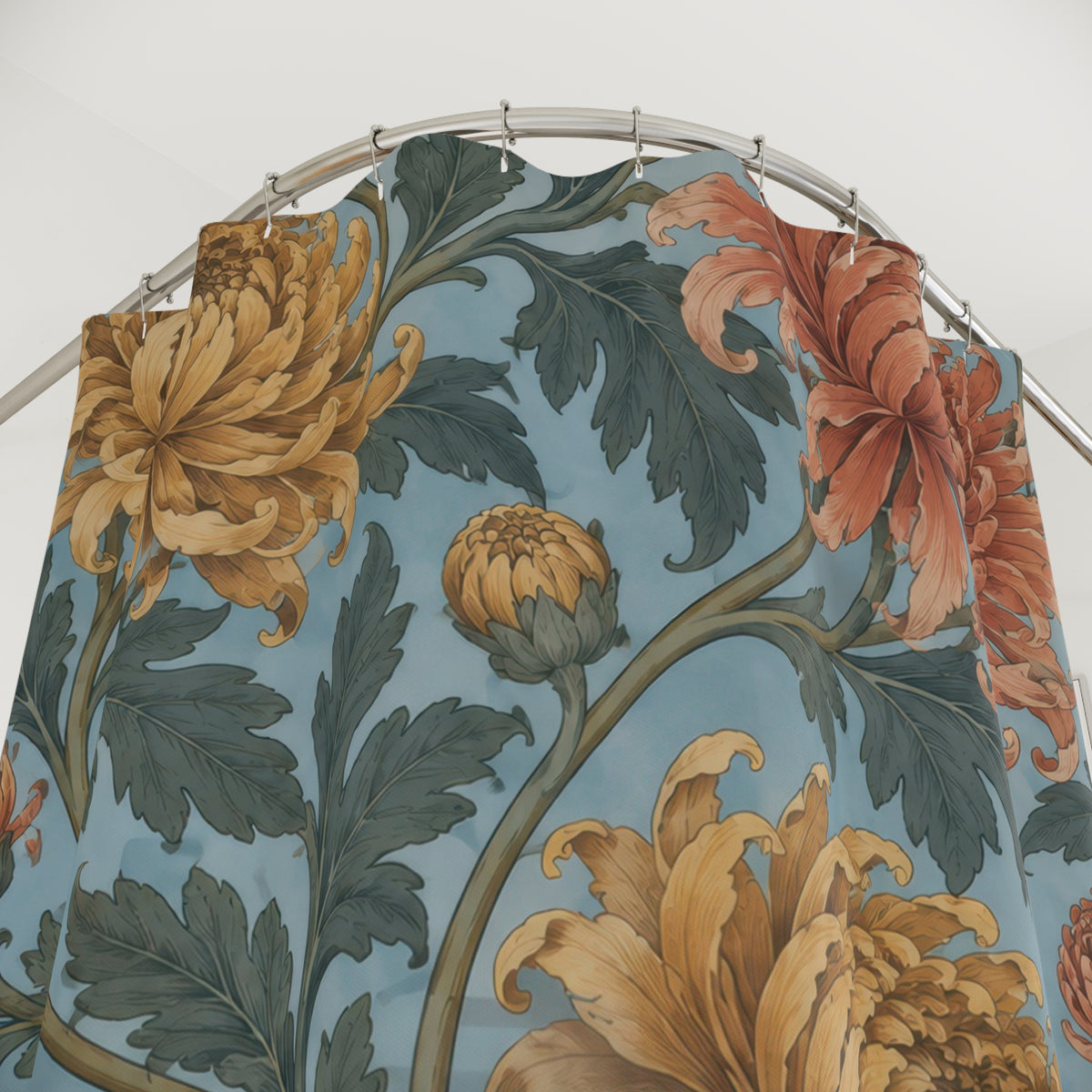 Ochre and coral chrysanthemums on powder blue shower curtain with close-up print, hooks, and folds