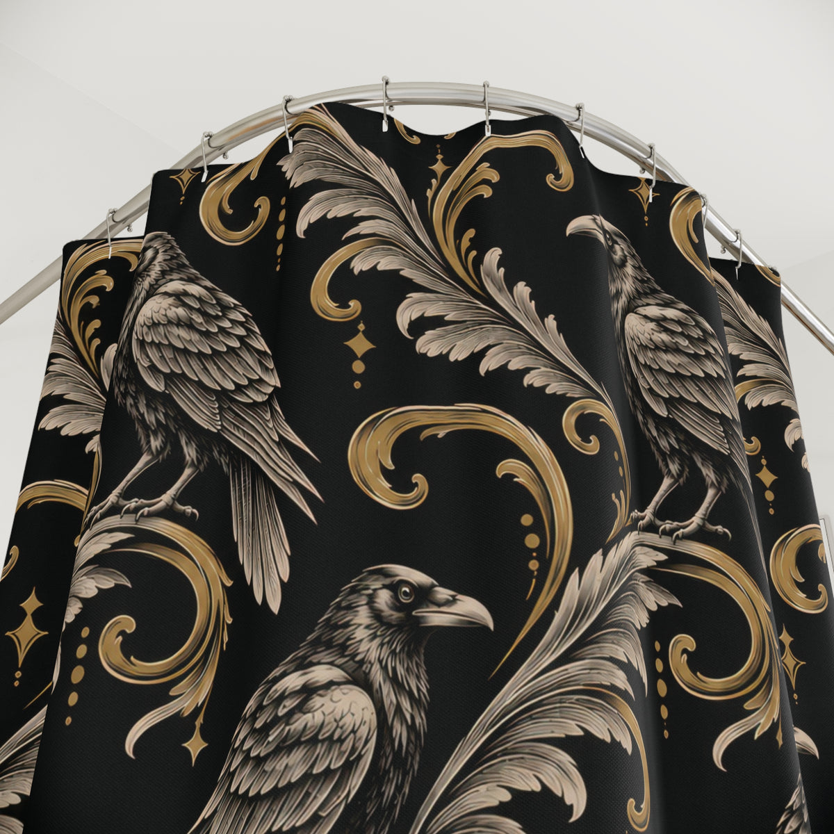 Ivory raven linework and gold-tone scrolls on black shower curtain with close-up print, hooks, and folds
