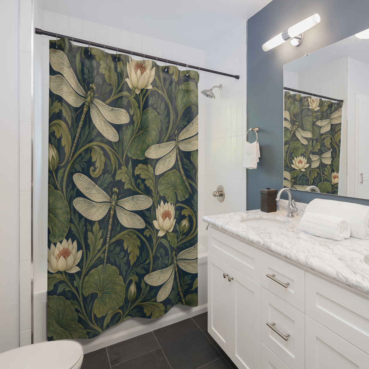 Olive and teal dragonfly waterlily shower curtain beside a white vanity