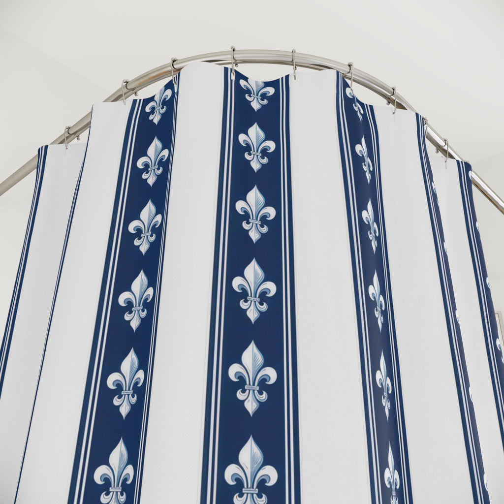 White fleur-de-lis motifs in navy and white vertical bands shower curtain with close-up print, hooks, and folds