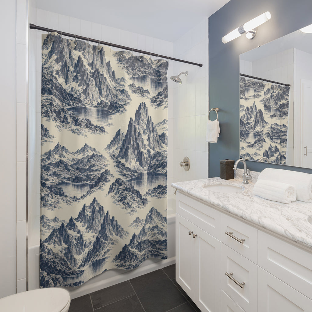 Indigo mountain and lake toile on ivory shower curtain beside a white vanity