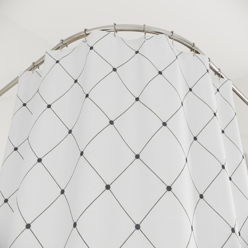 Fine gray diamond lattice with charcoal dots on white shower curtain with close-up print, hooks, and folds