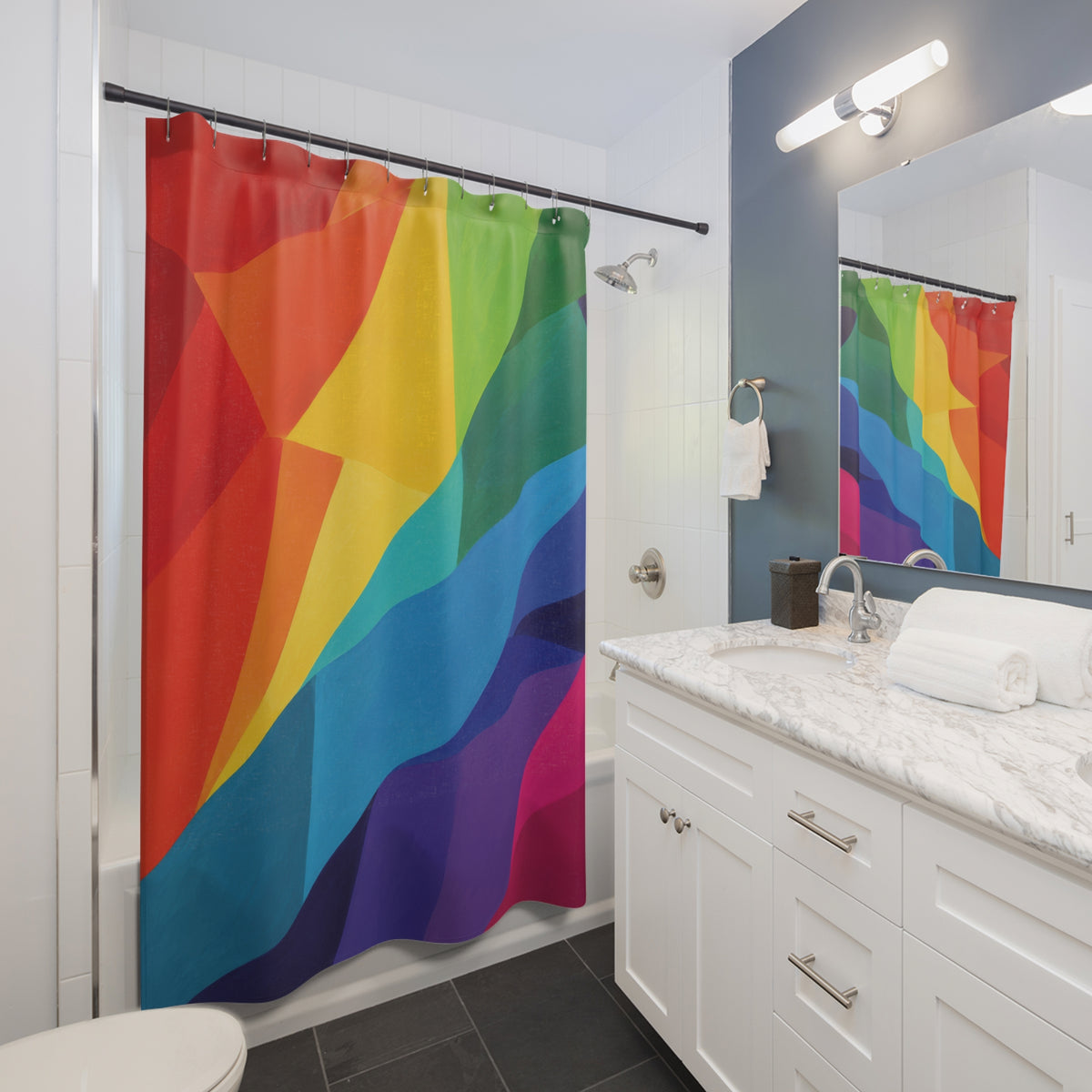 Sweeping rainbow color blocks with deep blue accents shower curtain beside a white vanity