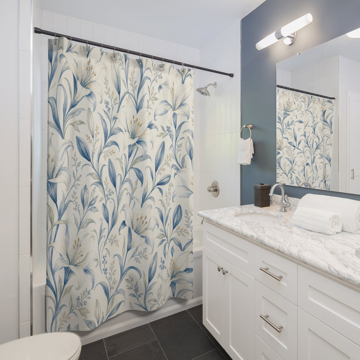 Blue Art Nouveau botanical floral shower curtain beside a white vanity