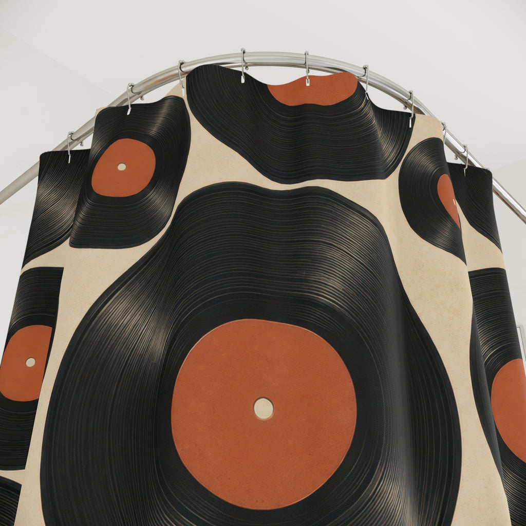 Black and burnt-orange vinyl record pattern shower curtain with close-up print, hooks, and folds