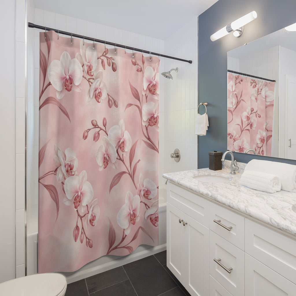 White orchids with rose stems on a blush ground shower curtain beside a white vanity