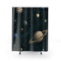 Blue and cream planets along gold orbits on dark teal shower curtain with full front view
